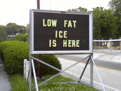 Roadside sign: LOW FAT ICE IS HERE